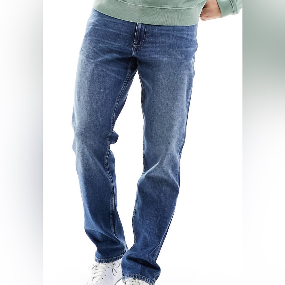 ASOS DESIGN straight leg jeans in mid wash blue